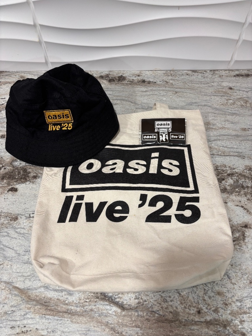 Oasis Live 25 Merch